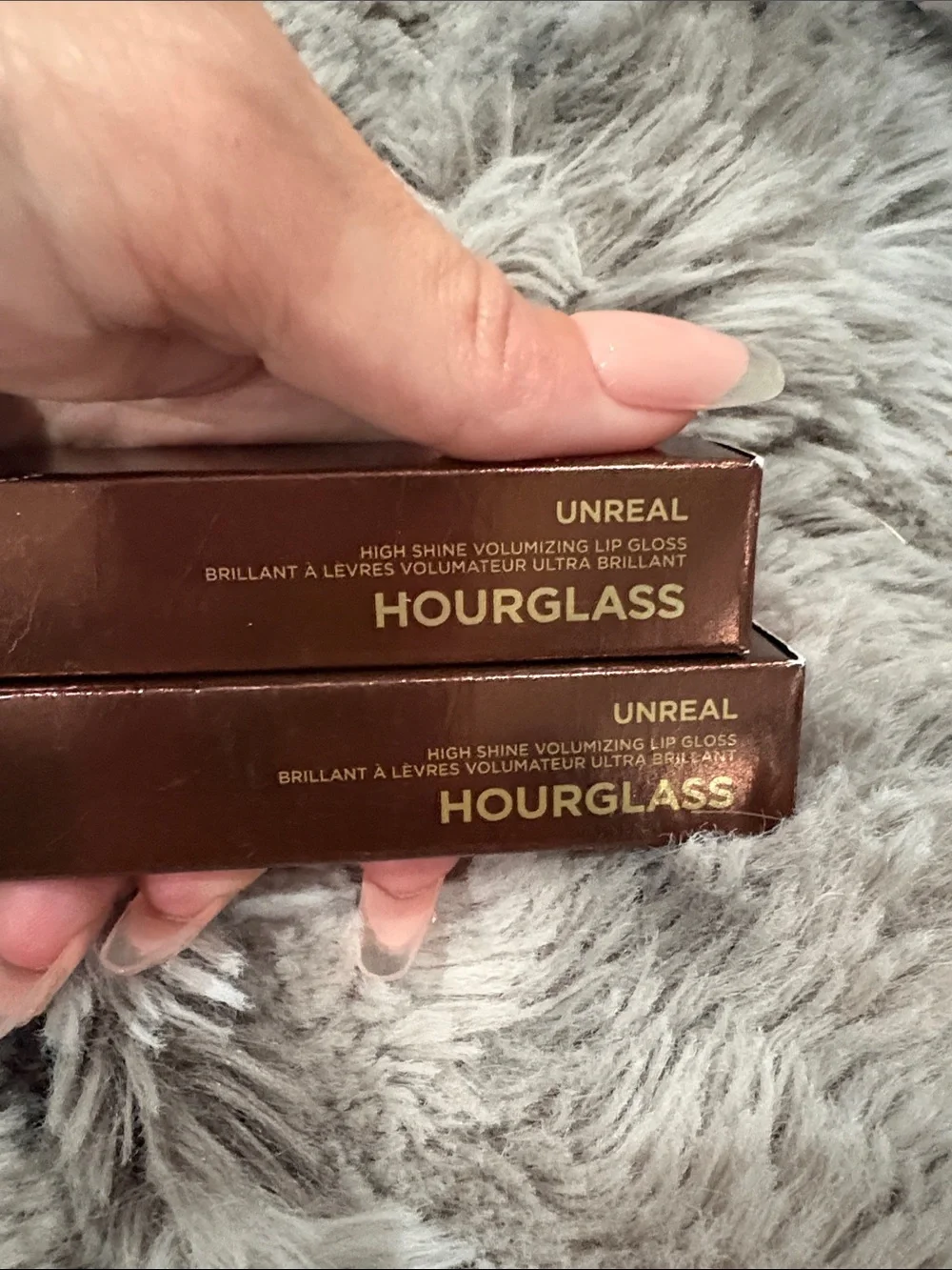 Hourglass Unreal High Shine Volumizing Gloss - Ignite (orange) & Enchant (pink)